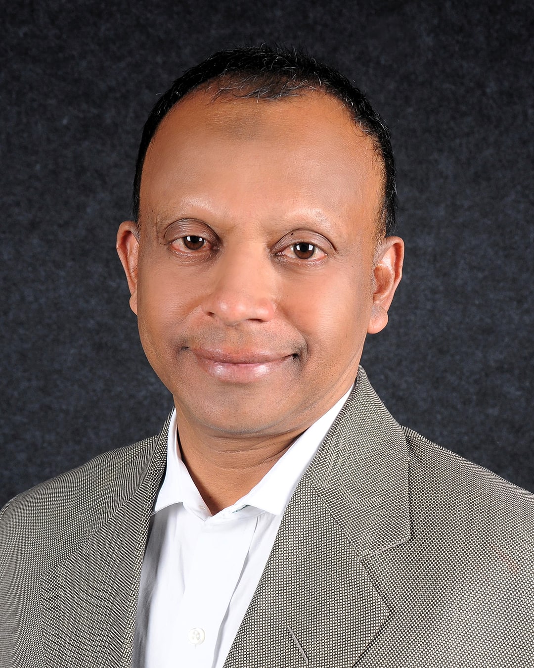 A black and white photo of Abdul Raqeeb