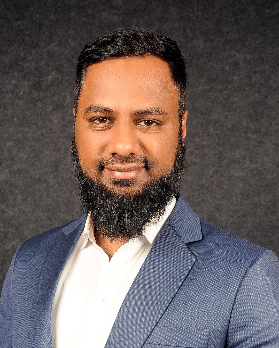 A black and white photo of Fasi Uddin